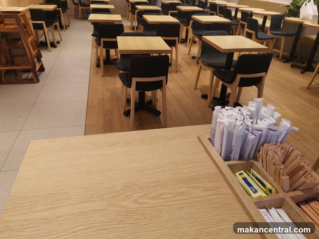 Cafe Interior with Seating and Condiments