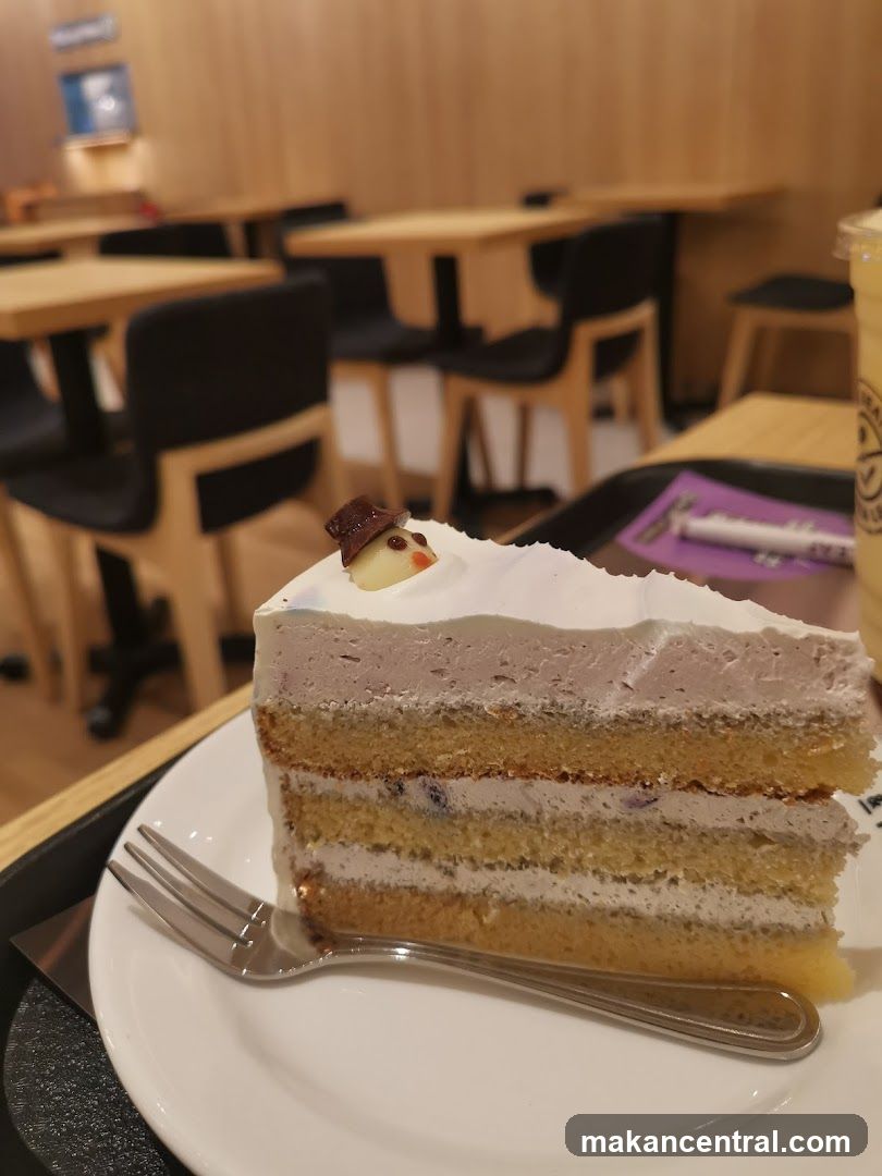 Slice of Cake with Snowman Decoration