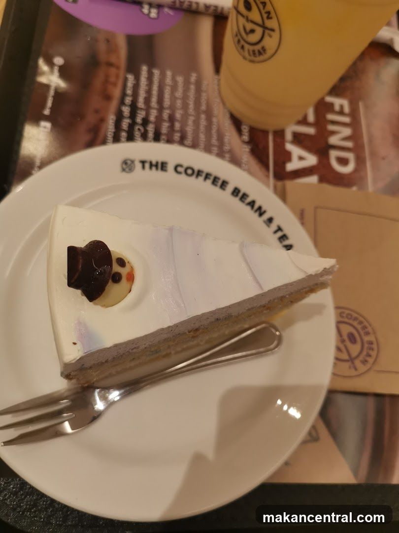 Slice of Cake with Snowman Decoration