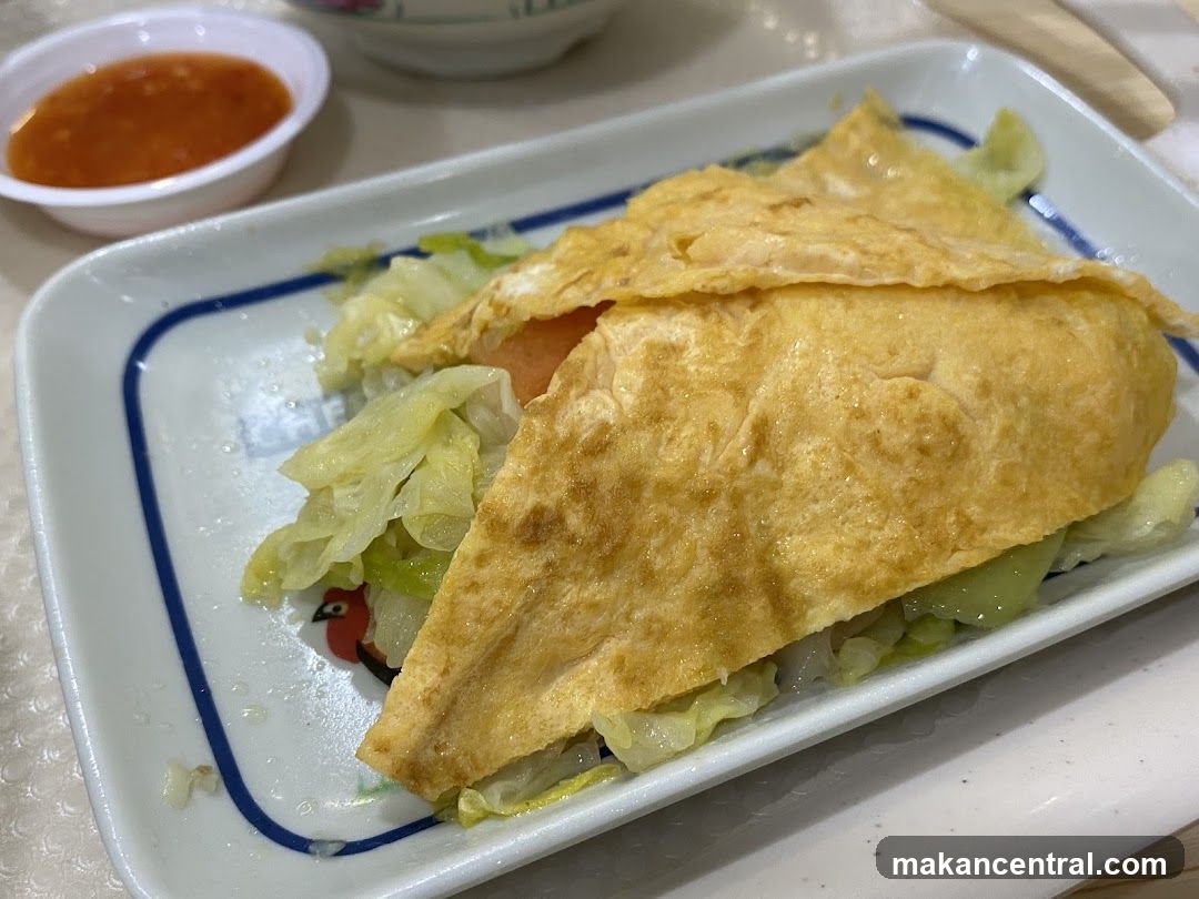 Omelet with Cabbage and Sauce