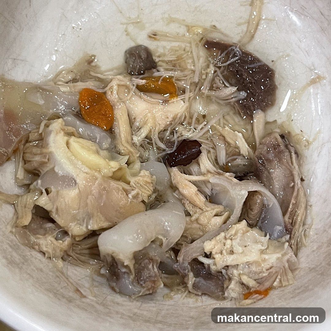 Bowl of Shredded Chicken and Grains