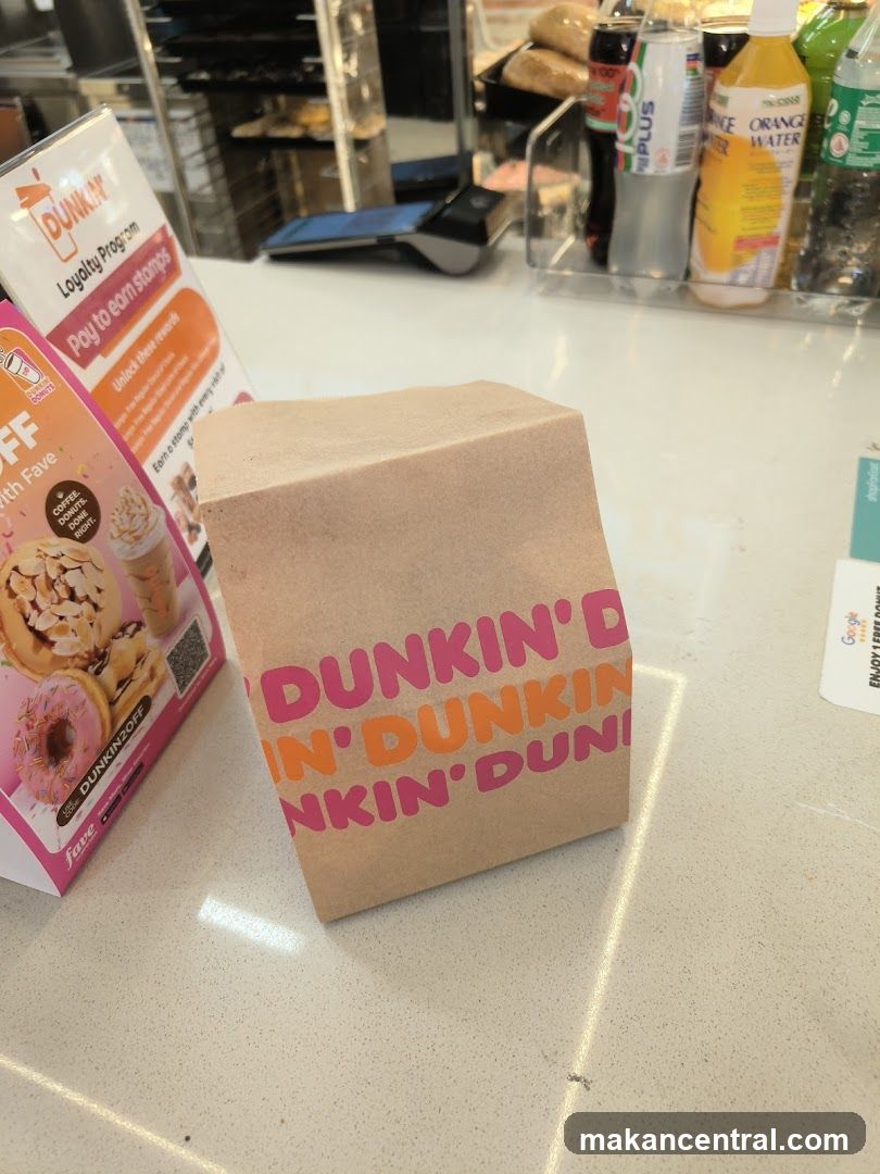 Dunkin' bag and promotional materials