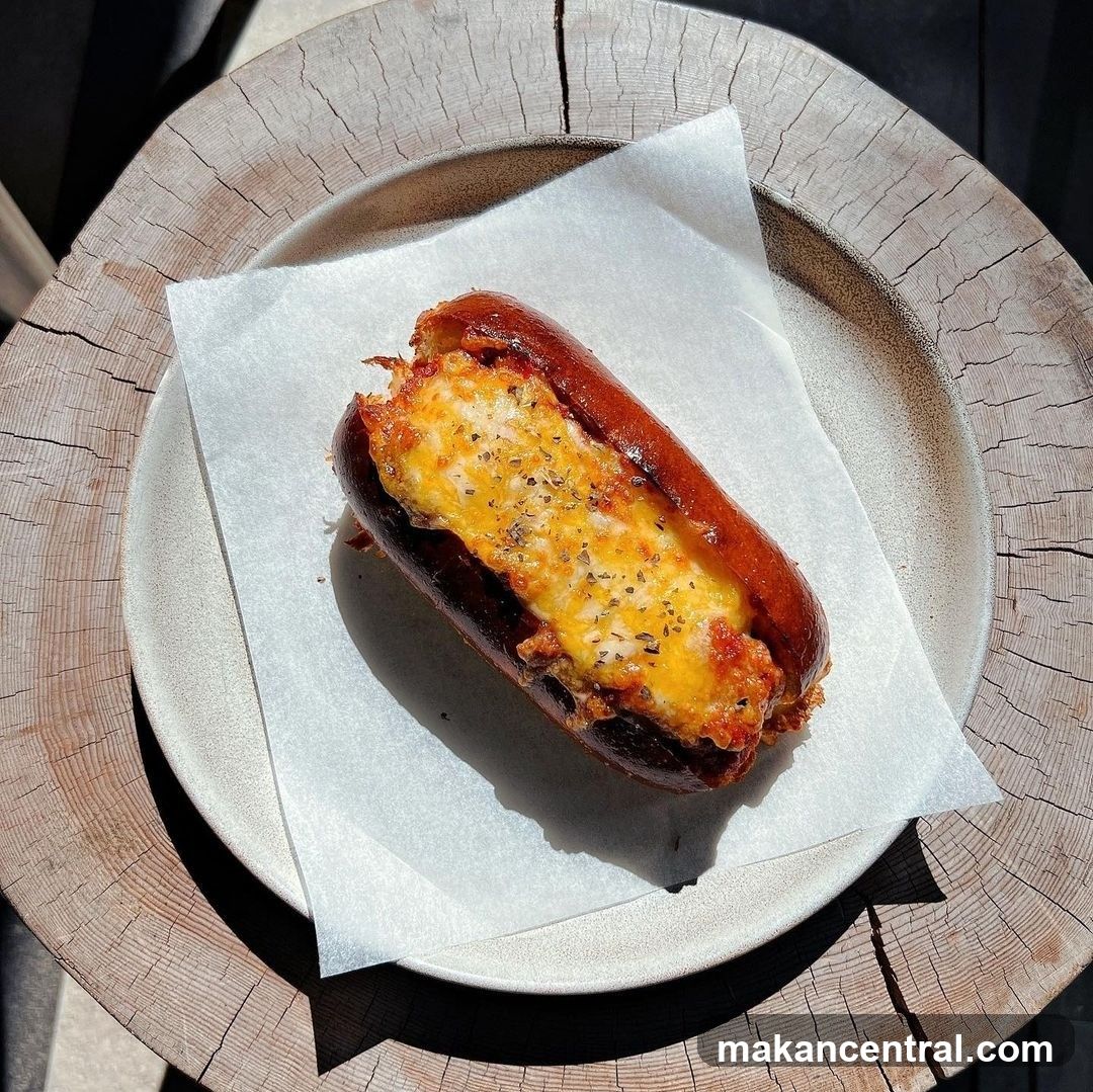 Hot Dog with Cheese and Sauce