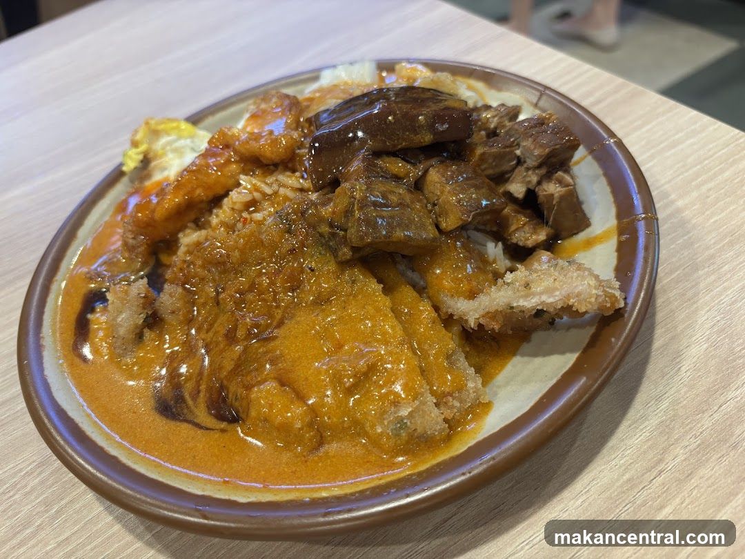 Plate of Rice with Various Toppings