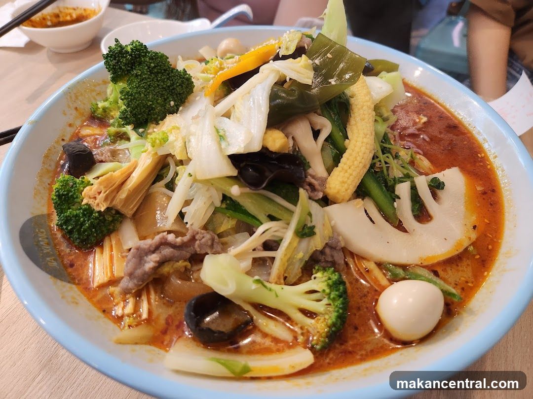 Spicy Noodle Soup with Vegetables and Meat