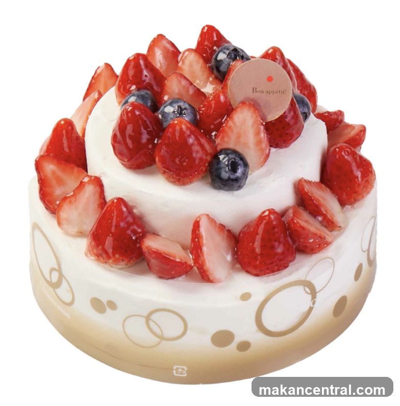 Two-Tiered Strawberry and Blueberry Cake