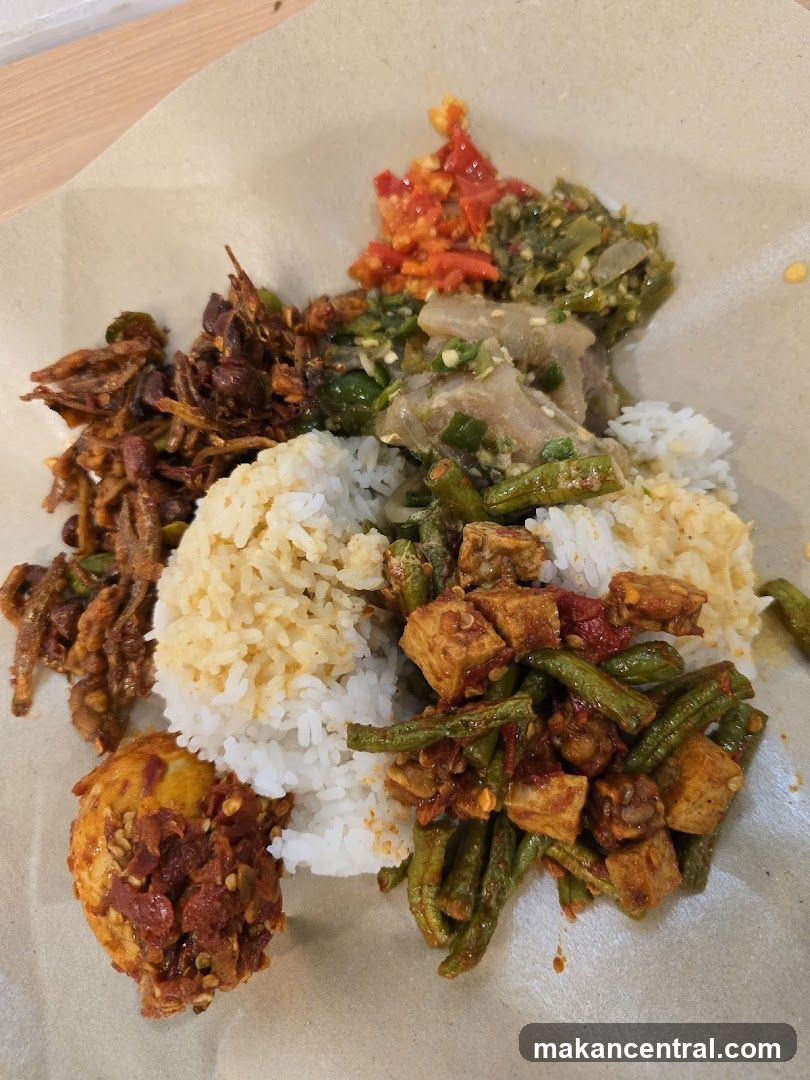 Plate of Rice with Various Toppings
