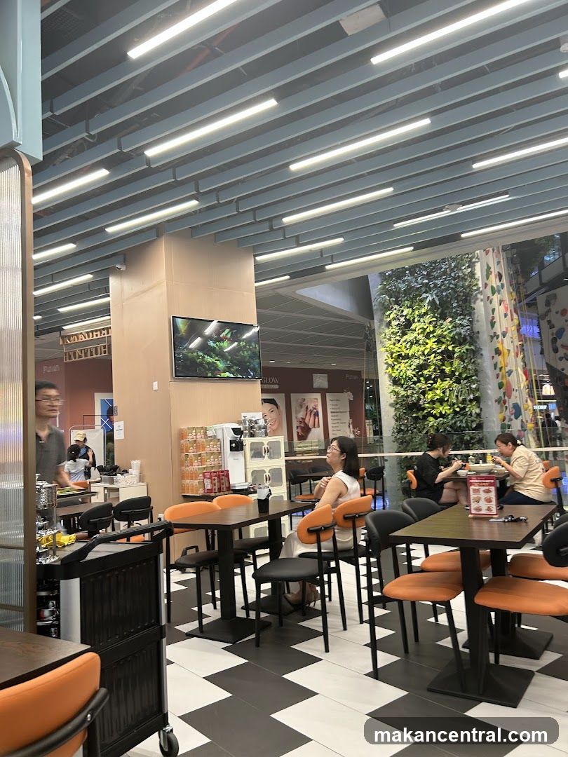 Indoor seating area with people dining