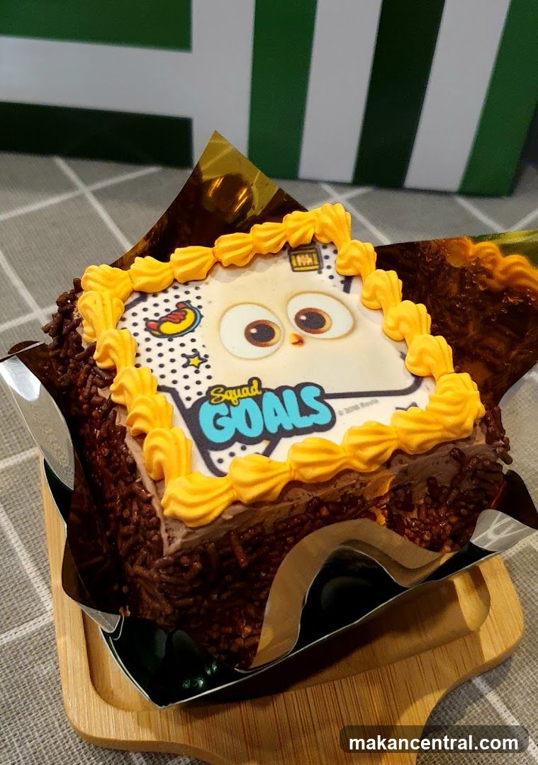 Chocolate Cake with "Squad Goals" Topper