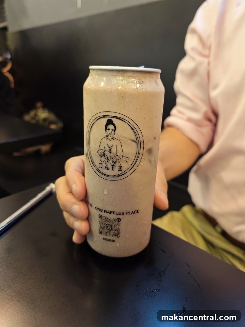Beverage in a can with cafe logo