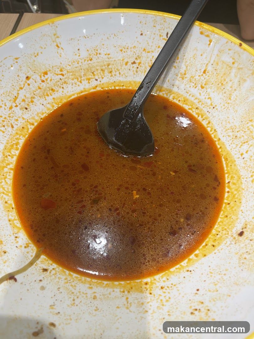 Bowl of Broth with Noodles
