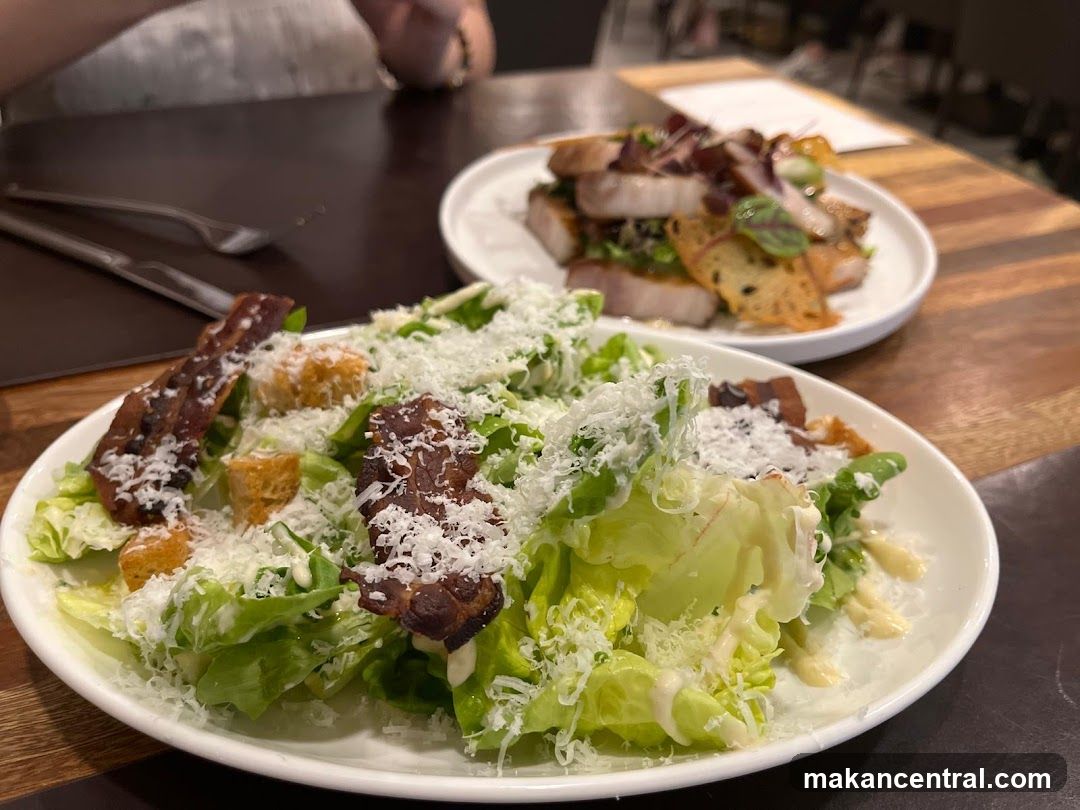 Caesar Salad and Pork Belly Dish