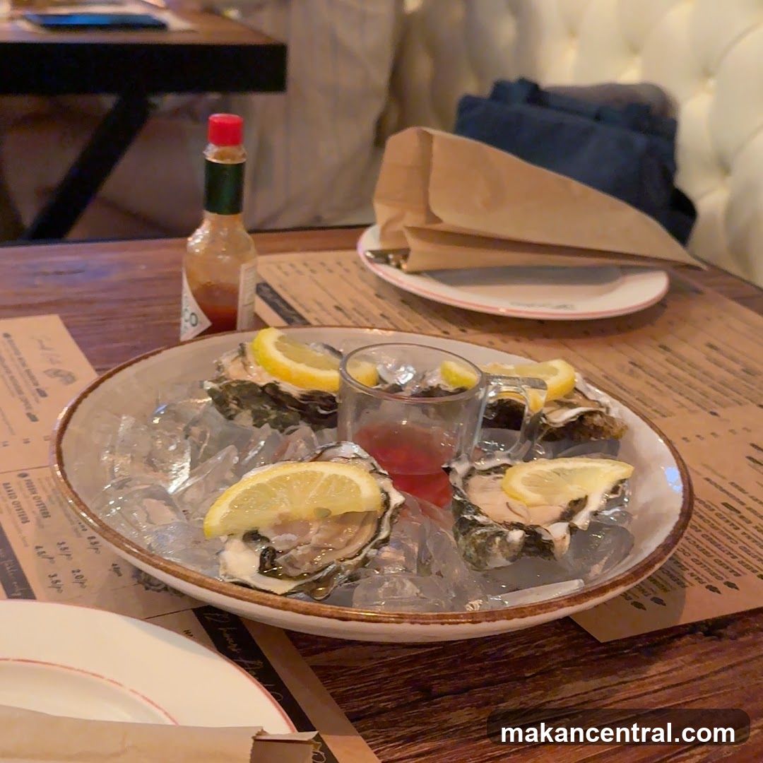 Oysters with Lemon and Sauce