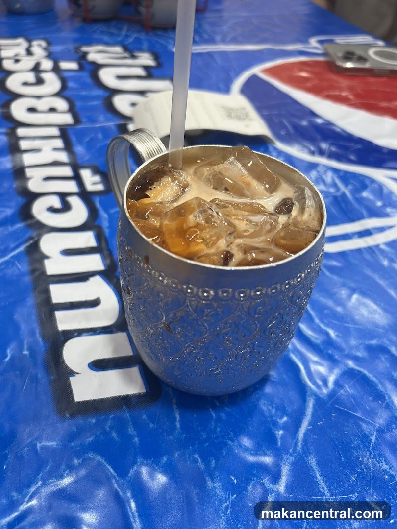 Iced Coffee in a Decorative Metal Cup