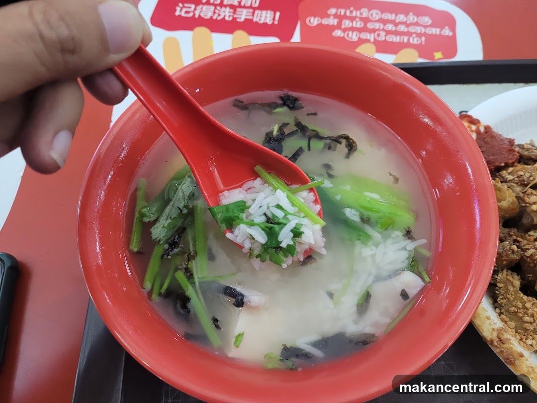 Bowl of Congee with Spoonful