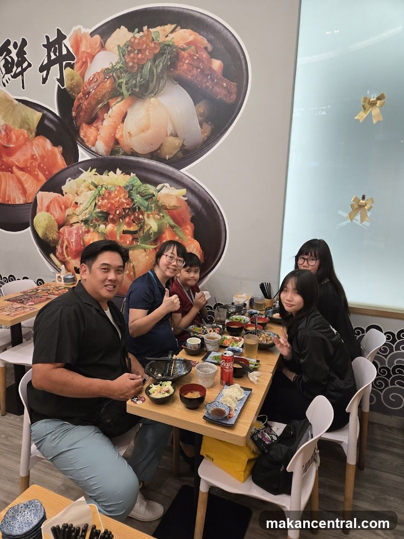 Family Enjoying a Meal at a Japanese Restaurant