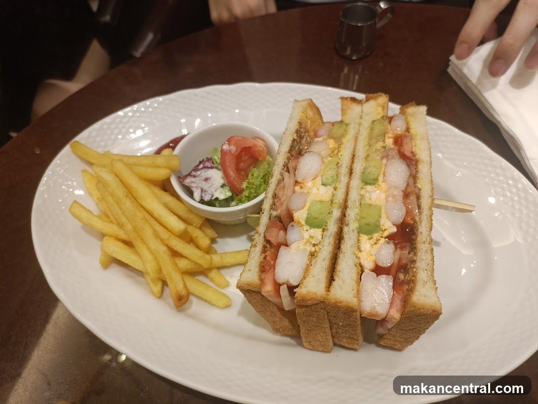 Shrimp sandwich with fries