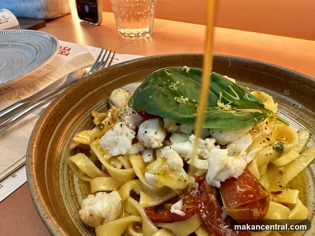 Pasta Dish with Tomatoes and White Fish
