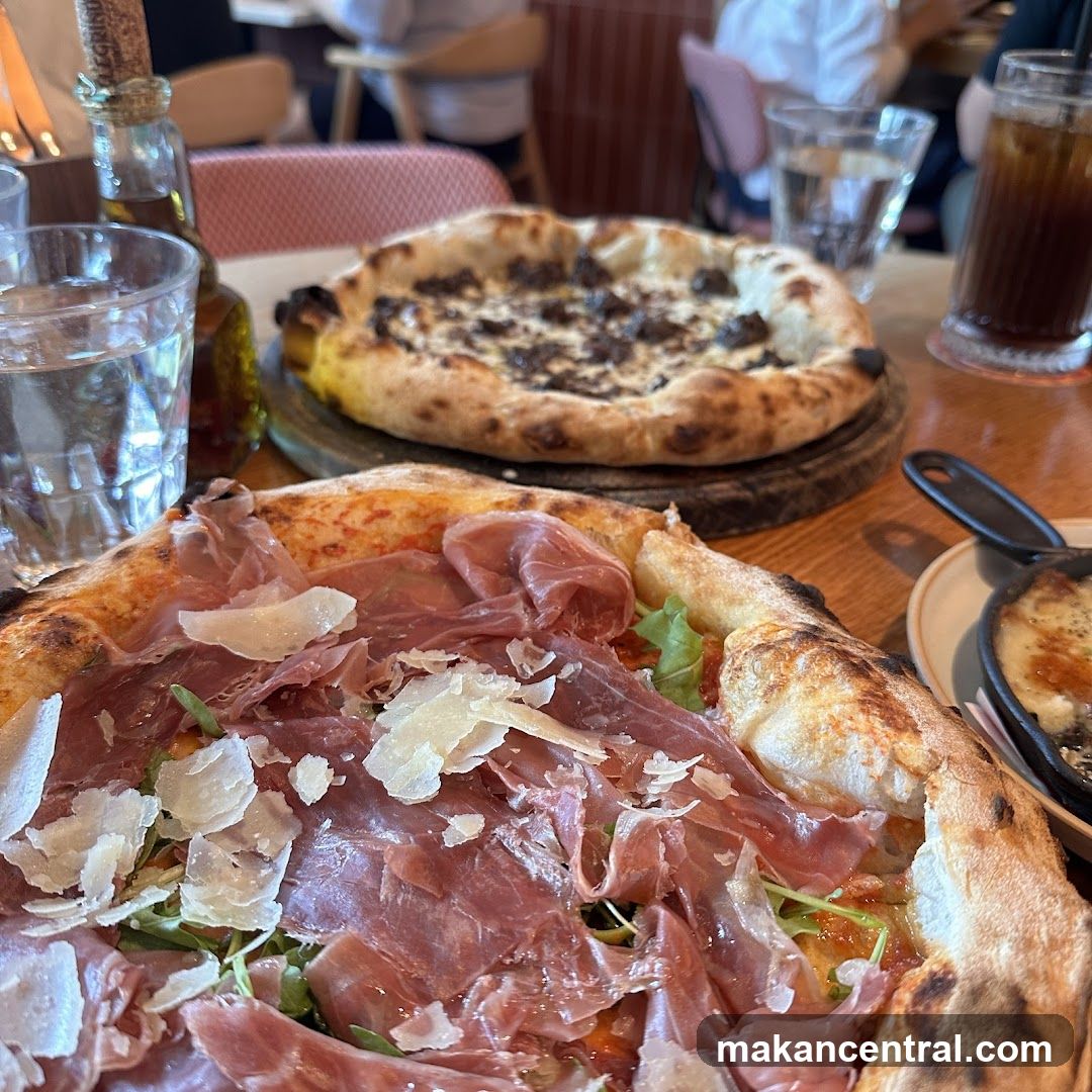 Two Pizzas on a Table