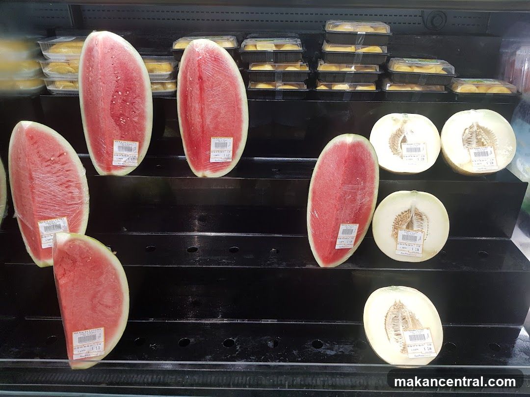 Cut Watermelons and Melons on Display