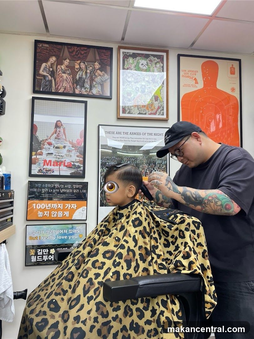 Barber cutting a child's hair