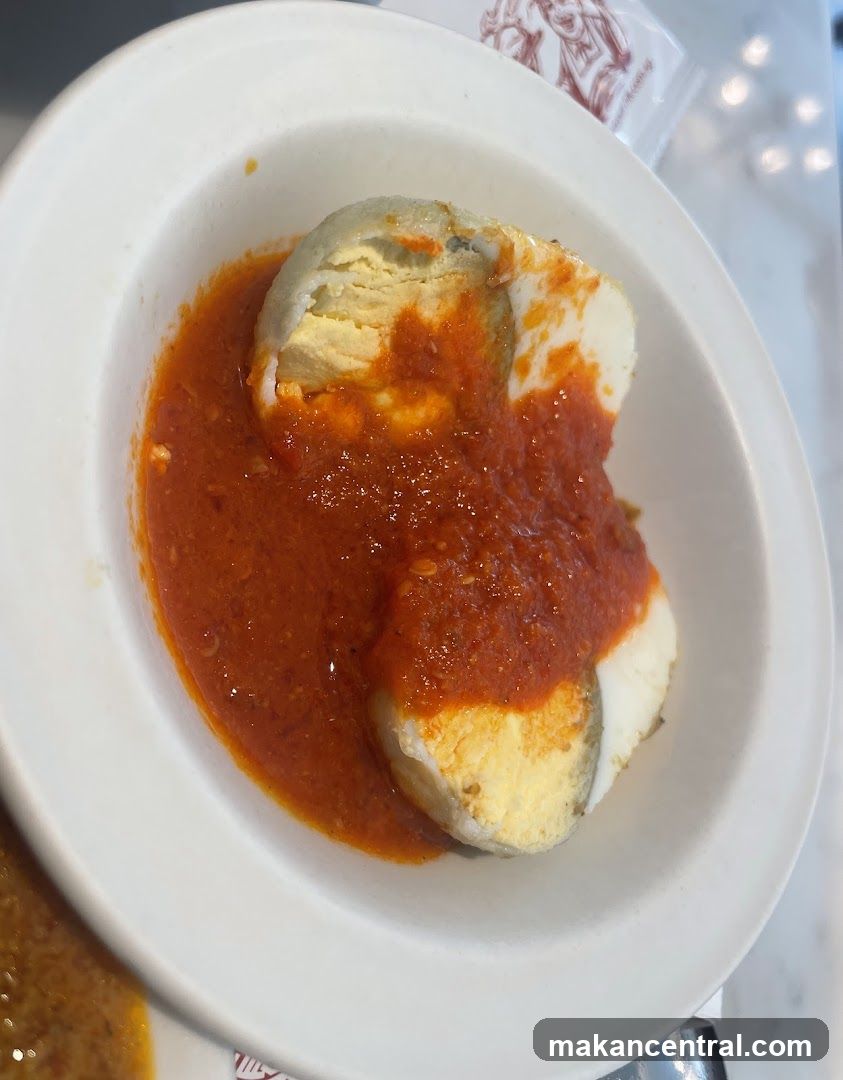 Hard-boiled eggs in sauce
