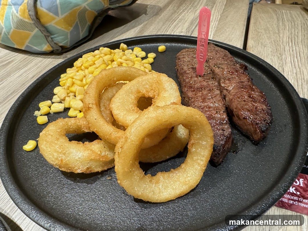 Steak Dinner with Onion Rings and Corn