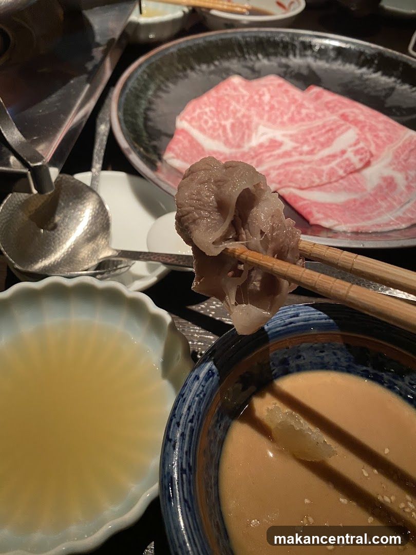 Dipping Meat in Sauce