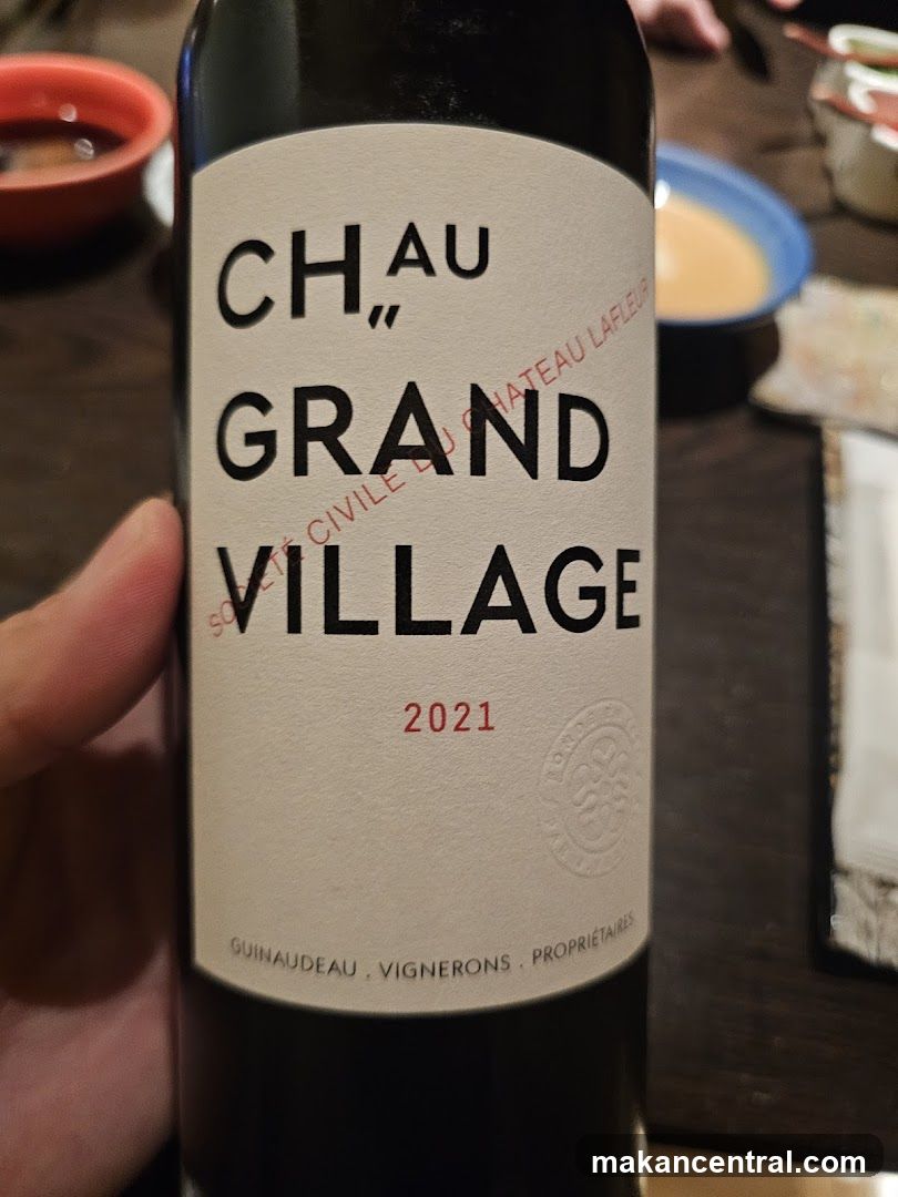 Chateau Grand Village Wine Bottle