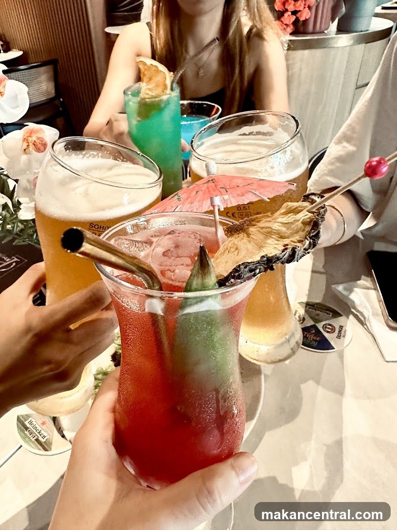 Friends toasting with cocktails