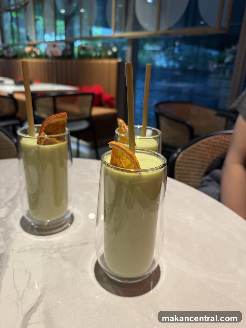 Green Smoothies with Orange Garnish