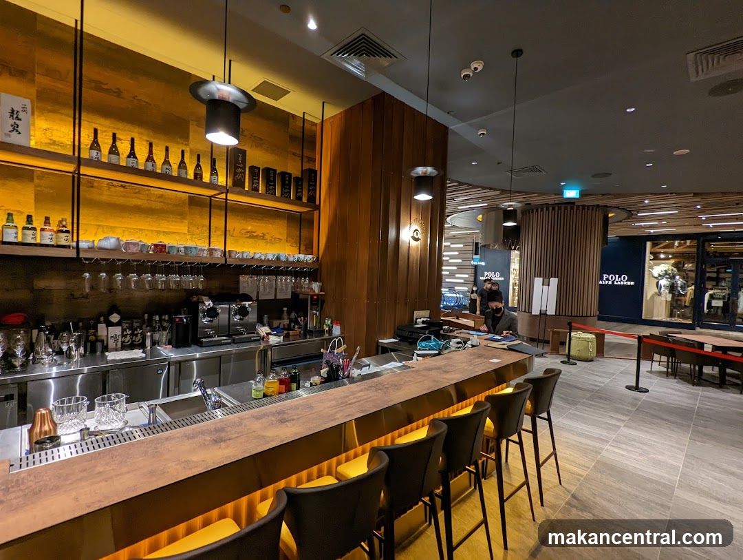 Bar Interior with Shelves of Bottles and Seating