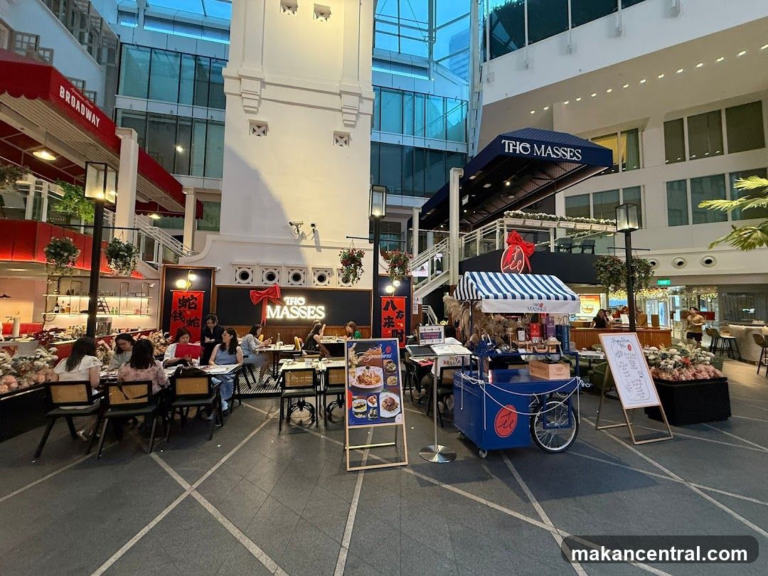 Outdoor dining area with a food cart