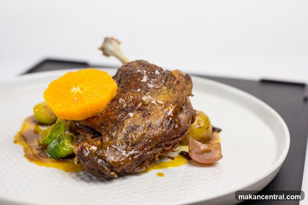 Duck Confit with Orange and Brussels Sprouts