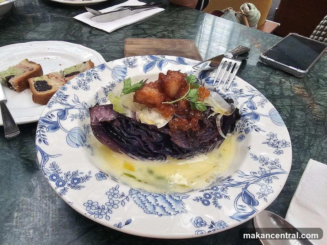 Gourmet Dish with Red Cabbage and Toppings