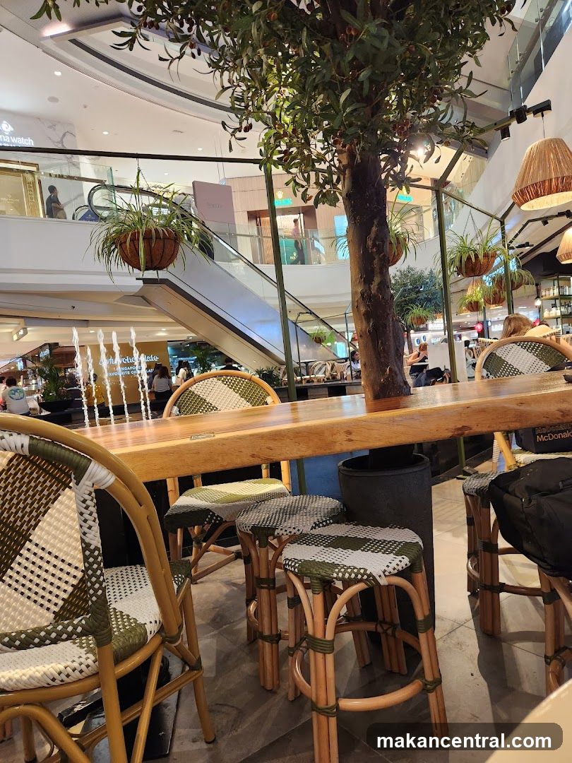 Indoor seating area with a tree