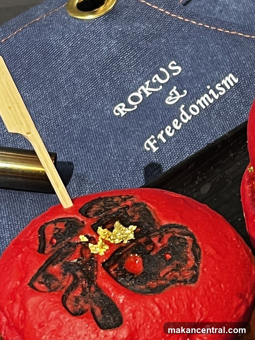 Red Bun with Gold Leaf and Chinese Character