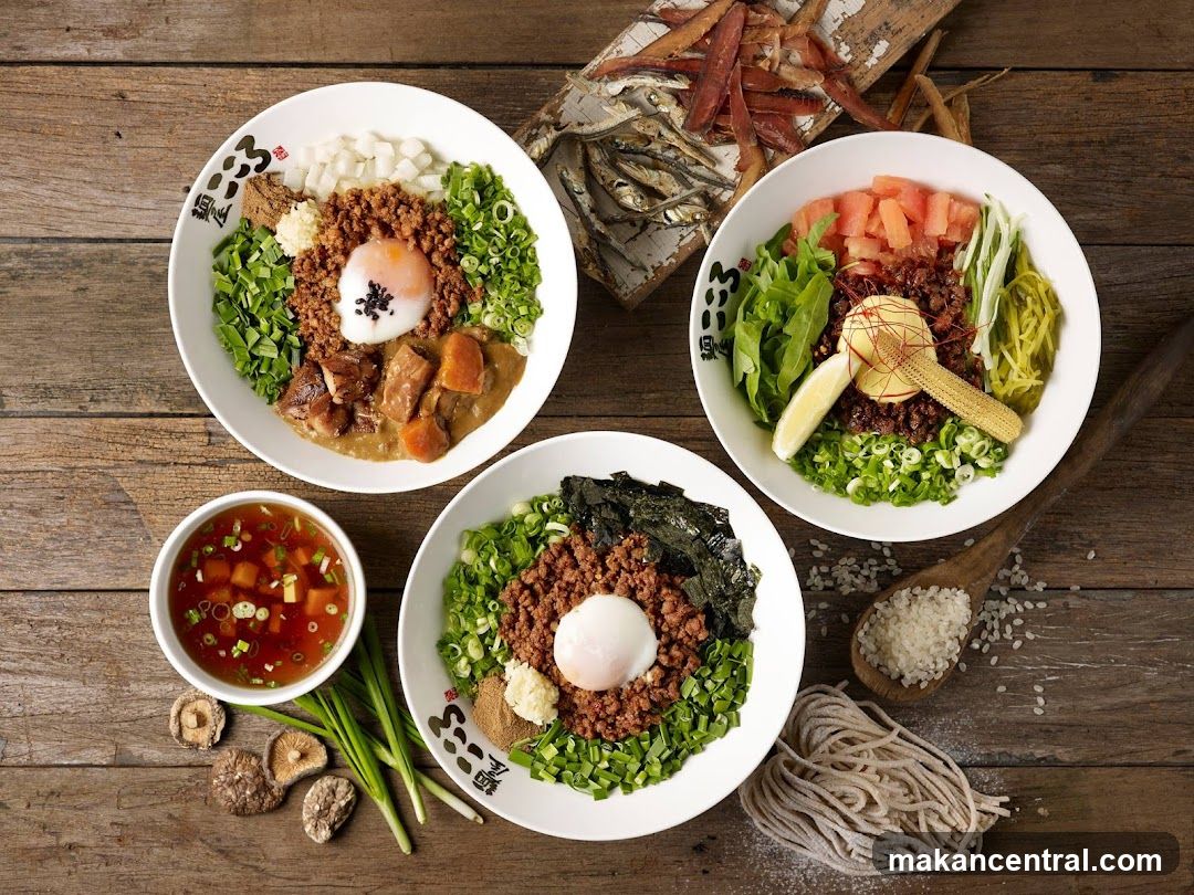 Three Bowls of Savory Toppings with Rice and Noodles