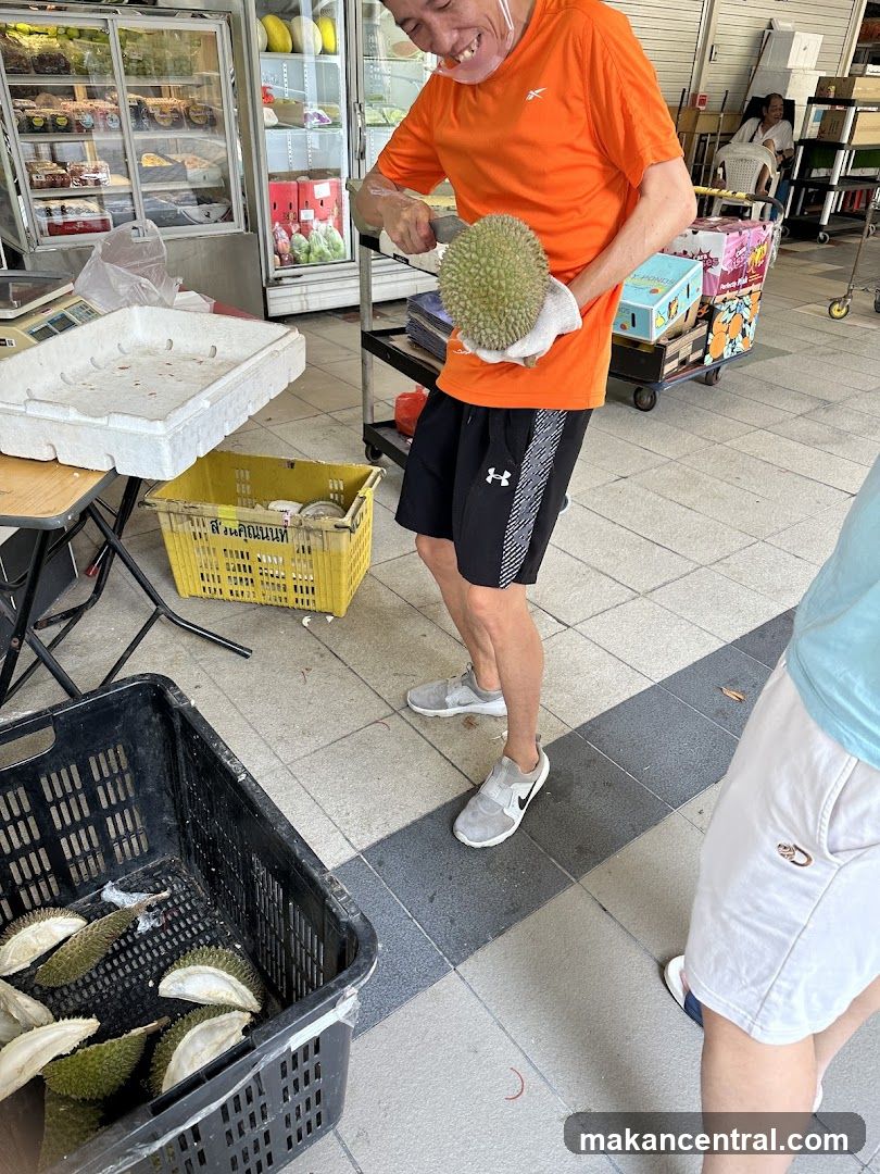 Man cutting durian