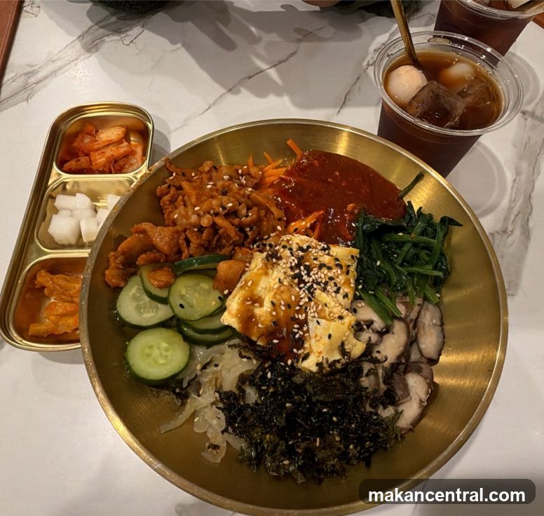 Bibimbap with Side Dishes and Drink