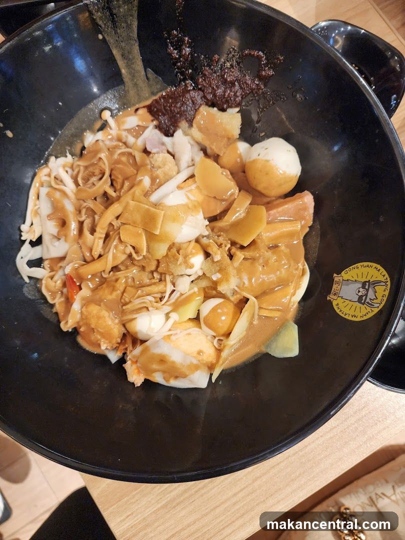 Bowl of Noodles with Various Toppings