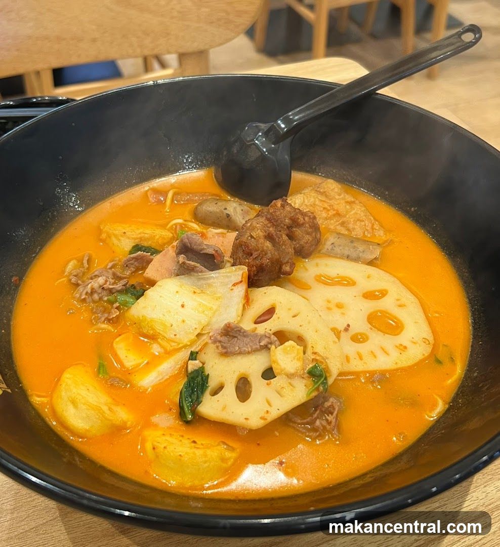 Spicy Noodle Soup with Meat and Lotus Root