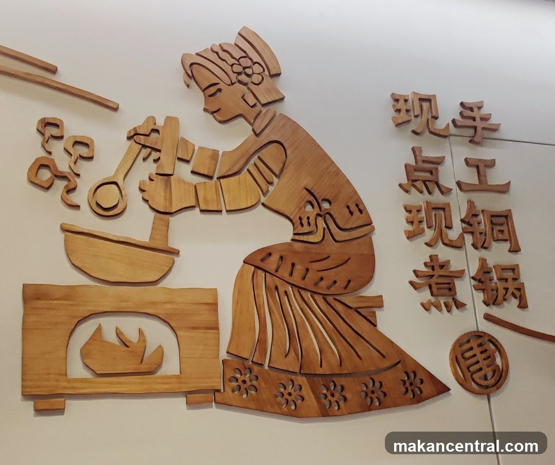 Wooden Carving of a Woman Cooking