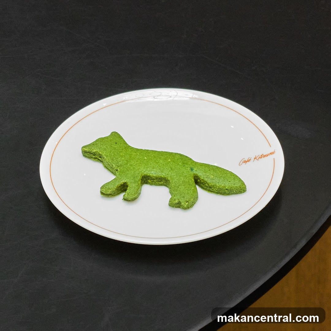 Fox-shaped cookie on a plate