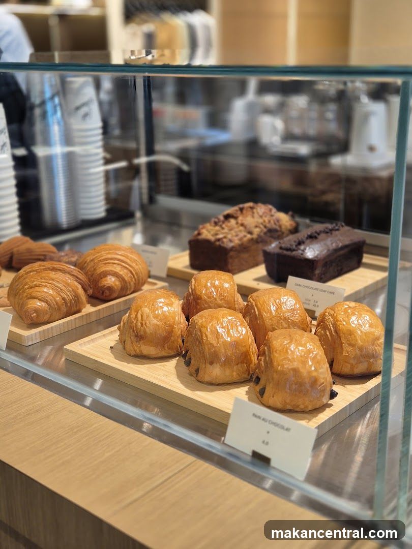 Pastries and Loaves in Display Case