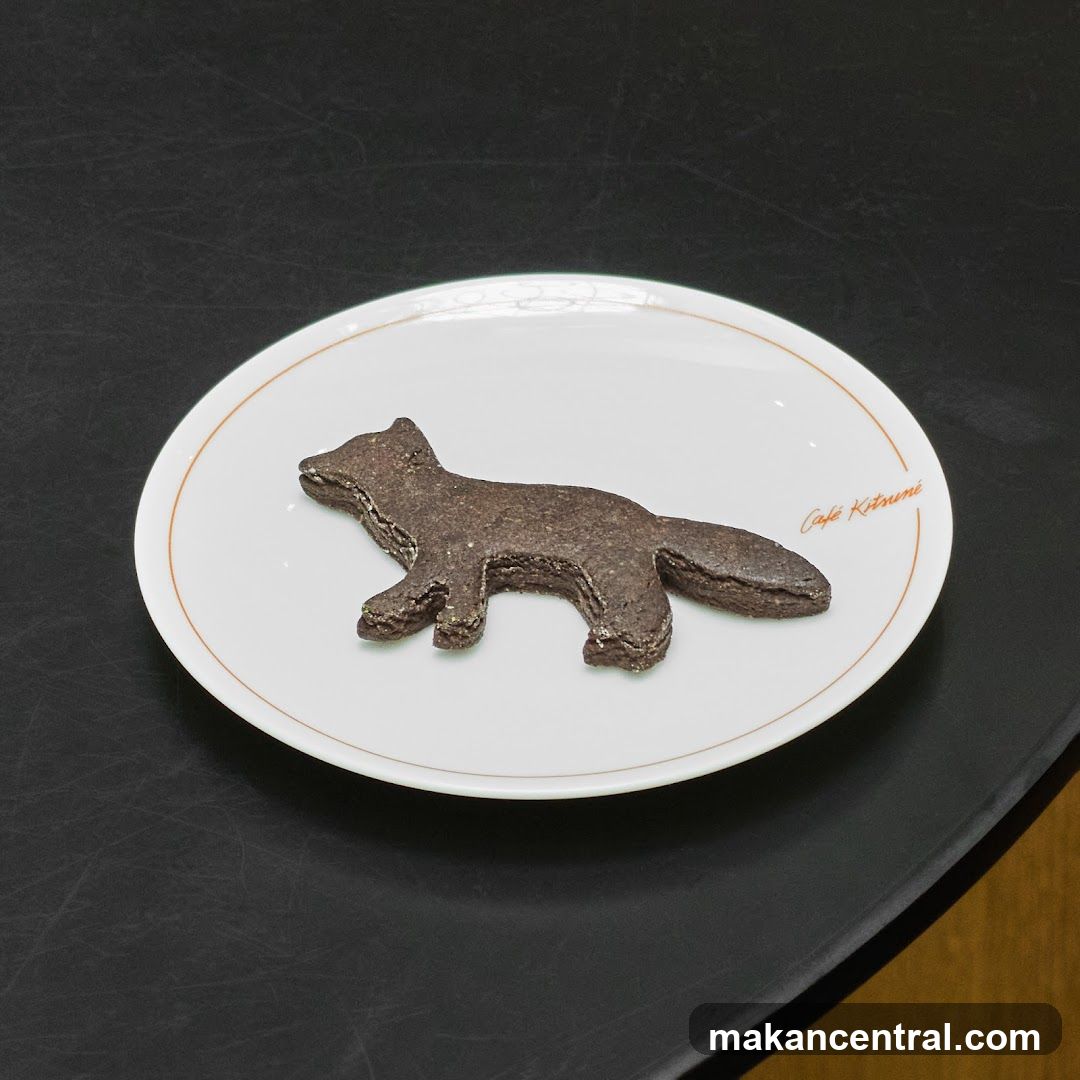 Fox-shaped cookie on a plate