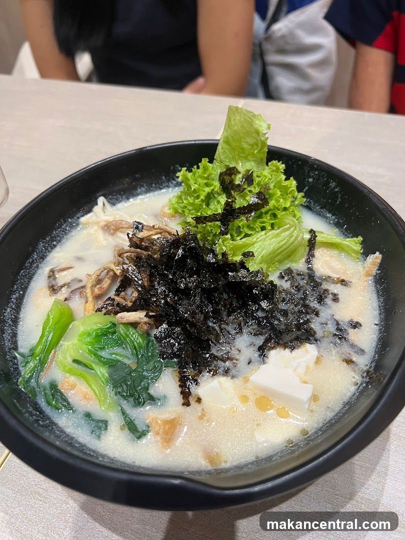 Bowl of Soup with Tofu and Vegetables