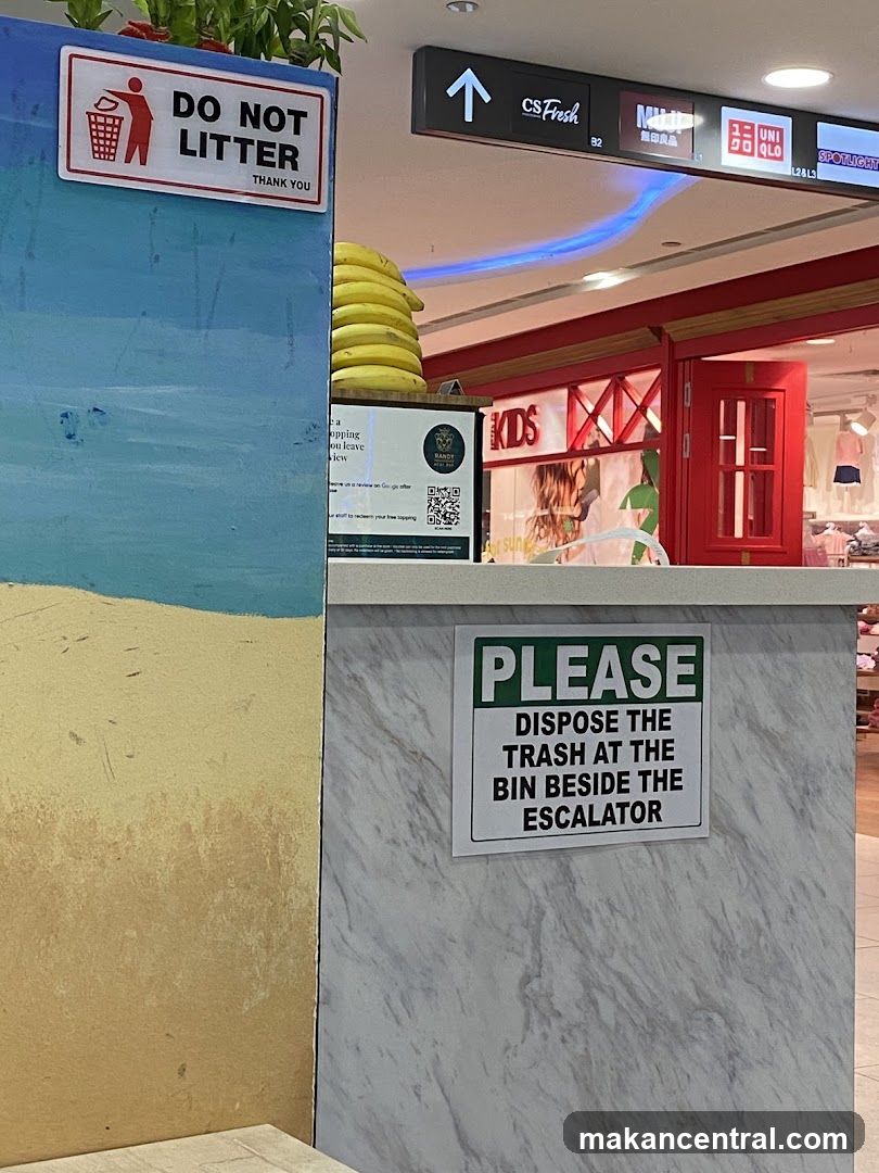 Mall interior with signage and store fronts
