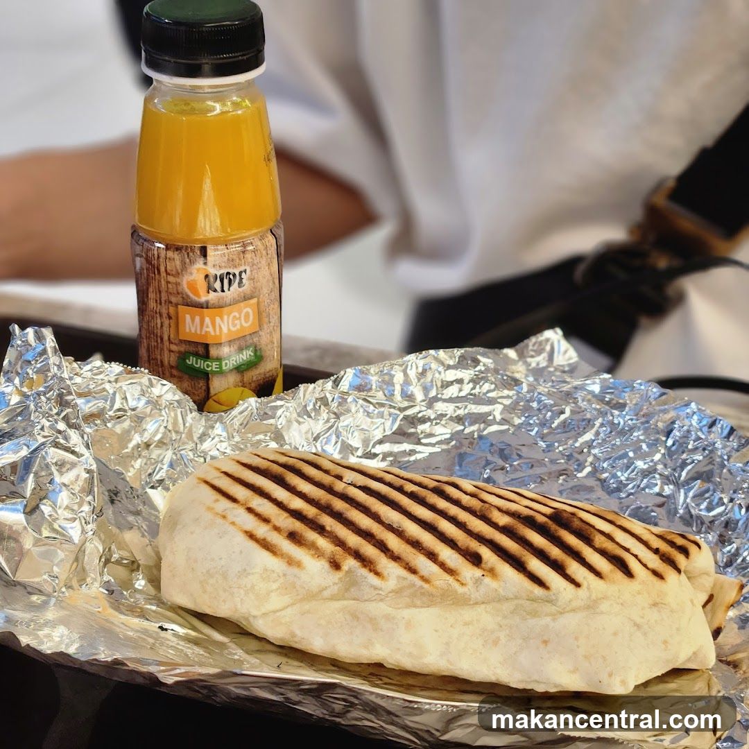 Grilled Wrap and Mango Juice