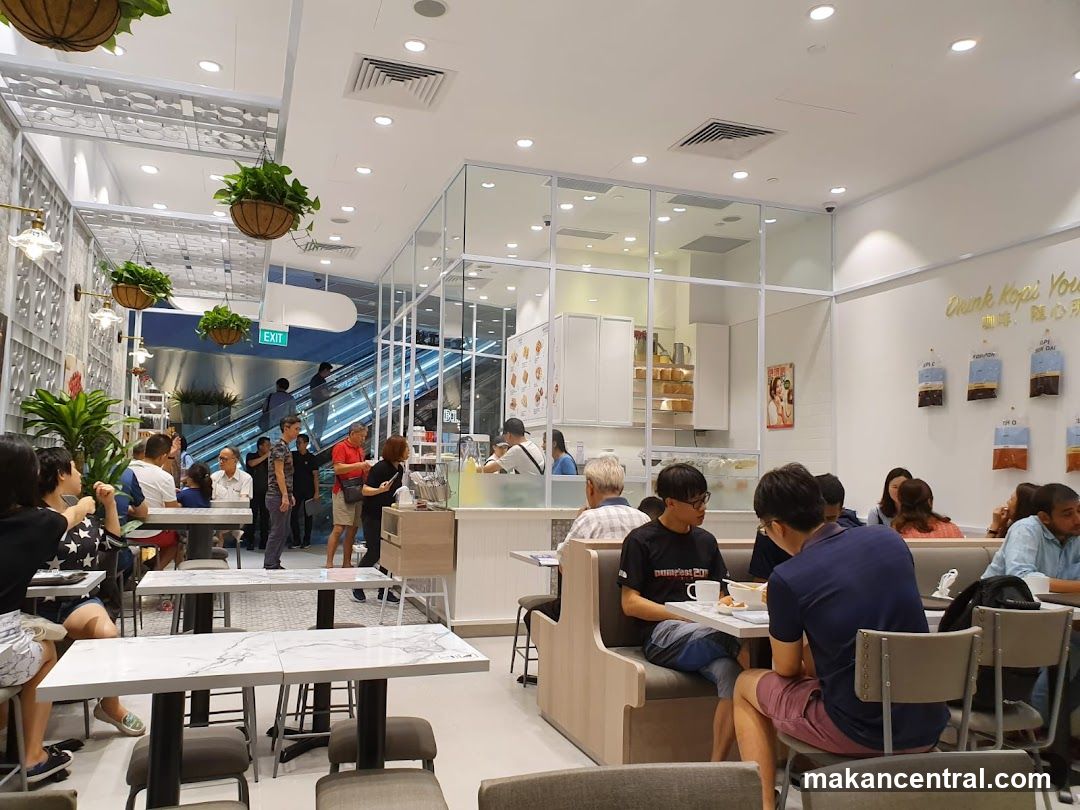 Interior of a cafe with customers